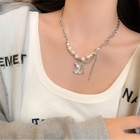 Colliers pendentifs mignons en forme d'ours blanc avec pompon pour femmes et filles, collier chaîne en perles d'imitation et pierres, bijoux cadeaux