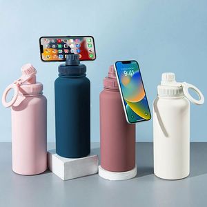 Bouteille d'eau isotherme en acier inoxydable de 32 oz avec logo personnalisé, couvercle magnétique et support pour téléphone, idéale pour la rentrée scolaire - Product Image 1