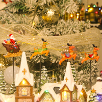 Oeuvre de Village de Noël directe d'usine avec lumière LED résine d'artisanat de traîneau de renne mobile pour centre commercial taille personnalisée