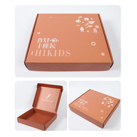 Boîte d'expédition en carton ondulé personnalisée. Papier kraft rose pour boîtes d'expédition de vêtements Logo personnalisé