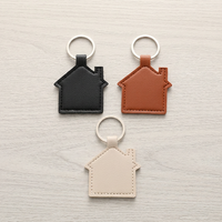Porte-clés en forme de maison en cuir PU, portable, multifonctionnel, décoratif, breloque promotionnelle pour sac, cadeau pour agents immobiliers