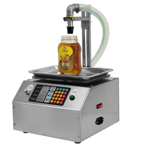 Machine de remplissage entièrement automatique pour <span class=keywords><strong>paille</strong></span> de miel pâte de sésame colle d'huile <span class=keywords><strong>comestible</strong></span> liquide visqueux/machine de remplissage liquide - Product Image 1