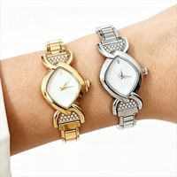 Montre bracelet à breloques pour femme, bijou de mode, montre-bracelet à quartz avec pendentifs mignons, bracelet à maillons en acier inoxydable, montre cadeau