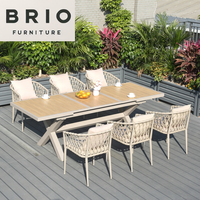 Ensemble de table et de chaises en bois plastique moderne pour l'extérieur, table extensible longue, imperméable, meubles de jardin en gros, directement de l'usine