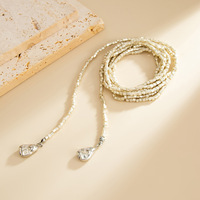 Collier ras du cou bohème en forme de Y avec pampilles dorées, perles irrégulières CCB, chaîne de clavicule à pampilles en forme de disque, pour femme, idéal pour les soirées