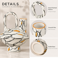 Vase à fleurs en céramique sculpturale créative Jossin avec des détails peints à la main en noir et orange pour une décoration minimaliste nordique