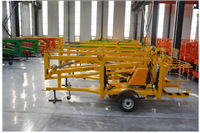 Plateforme élévatrice à ciseaux hydraulique remorquable robuste avec capacité de 200 kg et hauteur de levage de 10 à 22 m pour la manutention des matériaux