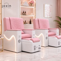 Fauteuil de pédicure rose moderne, mobilier de salon de luxe, fauteuil de spa pour les pieds pour salon de beauté avec accessoires de massage pour pédicure