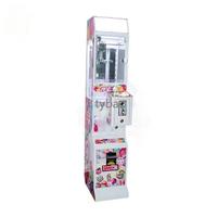 Vente en gros d'usine de bonbons à pièces jouet grue jeu distributeur automatique mini machine à griffes