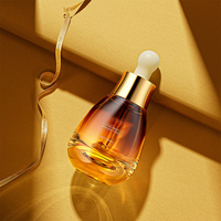 Flacon compte-gouttes d'usine d'emballage cosmétique de 30ml flacon de sérum en forme d'ampoule avec compte-gouttes en or et argent