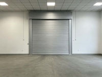 Les portes rapides coupe-feu en acier modernes et idéales conviennent aux centres de données, aux garages, aux projets de défense aérienne civile, etc.