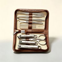 Kit de manucure 10 pièces, coupe-ongles en acier inoxydable, lime à ongles, étui en cuir, kit de toilettage portable pour homme et femme, cadeau