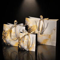 Sac cadeau en papier de luxe personnalisé avec poignée en ruban, logo personnalisé imprimé, sacs d'emballage pour le commerce de détail pour les petites entreprises