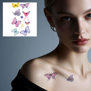 Adesivi Temporanei Impermeabili a Forma di Farfalla Colorata su Carta Bianca per Applicazione su Viso o Corpo, Farfalle Simulate - Product Image 1