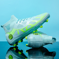 Chaussures de futsal personnalisées en gros avec logo TF, tige antidérapante en TPU et crampons en mesh, modèle 2509C, semelle intermédiaire en TPU pour entraînement professionnel, unisexe
