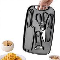 Ensemble de couteaux en acier inoxydable avec planche à découper et rangement, design moderne et minimaliste pour la cuisine, le camping et les barbecues en plein air