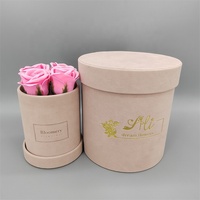 Boîtes à fleurs et à roses de luxe de forme ronde en matériaux recyclés avec couvercles, laminage mat et gaufrage