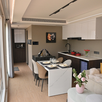Maison conteneur de luxe moderne personnalisée en usine, hôtel capsule mobile, imperméable, écologique, durable