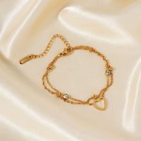 Bracelet chaîne en laiton plaqué or 18 carats avec zircon, motif cœur ouvert, serti clos, pour cadeaux d'anniversaire unisexe, style classique, fabrication de moules