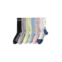 Chaussettes de cyclisme professionnelles épaisses personnalisées pour femmes, en coton, absorbantes, respirantes, antibactériennes, anti-odeurs, anti-boulochage, à motif géométrique