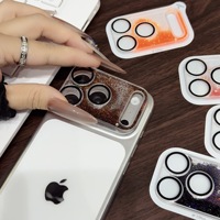 Protection d'objectif en verre trempé à absorption forte avec design pailleté effet sable mouvant pour iPhone 17 Pro Max