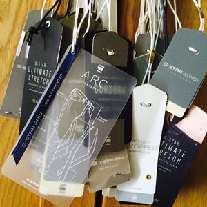A simple and versatile new thickened beige card-style clothing hang <b>tag</b>, a disposable tamper-evident clothing label hang <b>tag</b> - Product Image 6