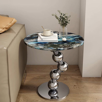 Table basse moderne en pierre frittée avec structure en acier inoxydable argenté – Design durable, écologique et pratique pour votre salon
