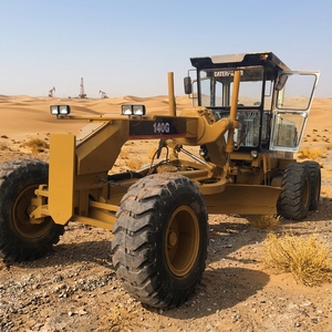 รถเกรดเดอร์ Caterpillar 140G มือสอง อุปกรณ์ก่อสร้างสำหรับงานหนัก พร้อมใช้งานในพื้นที่ทะเลทราย - Product Image 1