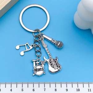 <span class=keywords><strong>Funky</strong></span> <span class=keywords><strong>Music</strong></span> Guitar Rack Drum Pop Instrument Llavero de metal Juguetes minimalistas Llaveros para amantes de la música Colgante - Product Image 4