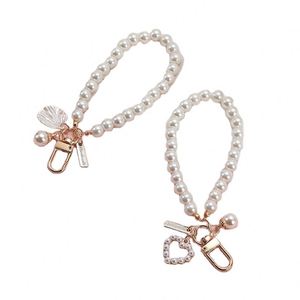 En gros, Porte-clés créatif en perle d'amour, édition coréenne, pendentif de sac rétro en perle de coquillage, accessoires de suspension pour écouteurs - Product Image 4