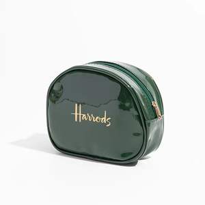 सुरुचिपूर्ण कस्टम मेकअप बैग उच्च गुणवत्ता वाले पेटेंट चमड़े का फैशन Pu सामग्री पानी प्रतिरोधी फोल्डेबल पानी प्रतिरोधी फोल्डेबल - Product Image 5