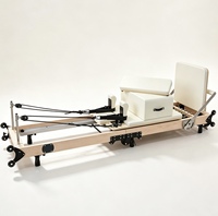 Machine d'entraînement Pilates Reformer pliable et portable en bois d'érable massif, réglable pour le levage des jambes, idéale pour studio et salle de sport - Vente en gros