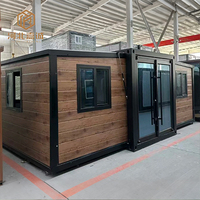 Maison conteneur modulaire pliable à double aile de haute qualité, villa robuste à structure en acier, logement temporaire extensible