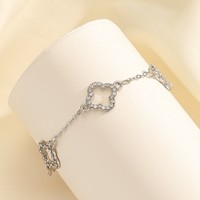 Bracelet trèfle porte-bonheur double face en acier inoxydable plaqué or 18 carats de haute qualité pour femmes Bijoux en acier inoxydable