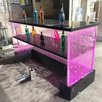 Table de bar ronde mobile en acrylique avec design à bulles d'eau, lumières LED RGB et télécommande tactile/sans fil pour restaurants et usage domestique