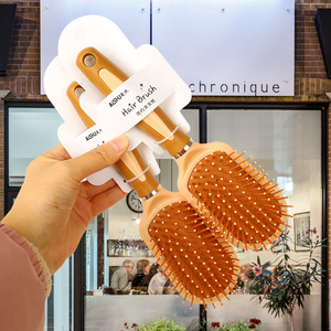 Cepillo para el cabello ovalado de plástico con cojín de masaje para la población en general - Product Image 2