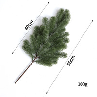 Branches de pin PE artificielles en gros transfrontalier pour les fournitures de décoration d'arbre de Noël