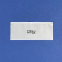 Sac de rangement transparent mat en PE avec fermeture éclair auto-adhésive pour vêtements et chaussettes, personnalisation de l'emballage plastique