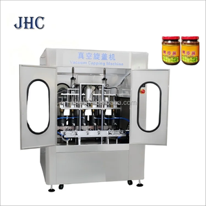 Machine de capsulage sous vide semi-automatique pour bouteilles et bocaux de miel et de sauces, conforme aux normes alimentaires et à haute efficacité. - Product Image 3