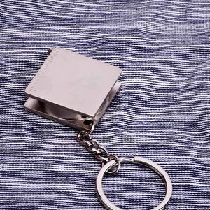 Mini cinta métrica retráctil de 1m, llaveros con cierre deslizante <span class=keywords><strong>para</strong></span> favores de fiesta de cumpleaños y bolsa de PP de uso diario, cinta de acero al carbono - Product Image 4