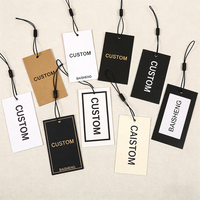 Étiquette suspendue personnalisée OEM en papier avec estampage à chaud or, finition mate, carte noire et blanche, corde en coton pour vêtements féminins, bijoux et accessoires