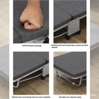 Lit d'appoint pliant de bureau moderne et minimaliste en métal pour la pause déjeuner ou la sieste, lit pliant à trois sections