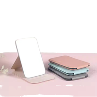 Miroir de Maquillage Portable Pliable au Design Moderne pour Femme – Idéal pour les Retouches sur le Bureau