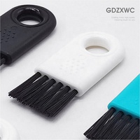 Brosse à clavier en plastique conception antidérapante 10 couleurs rasoir fissure mini brosse porte-clés accessoires gadget rasoir haut-parleur