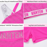 Ensemble soutien-gorge et short de cheerleading personnalisé avec nom d'équipe, bretelles asymétriques et strass, tenue d'entraînement sur mesure
