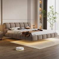 Lit flottant simple moderne crème vent oreilles d'éléphant suspendus en cuir Napa chambre principale lit double