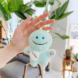 Venta al por mayor de lindos y modernos conejos, pequeños dinosaurios y cabras, muñecos de peluche blancos cortos, llaveros con relleno de algodón PP, súper suaves, EN71 - Product Image 3