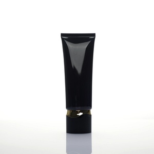 Envase cosmético ovalado negro de lujo al por mayor con tapa ovalada dorada para loción, envase exprimible para el cuidado de la piel - Product Image 1