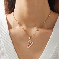 Collier tendance hip-hop en acier inoxydable avec pendentif chaussure de sport en toile créative pour hommes et femmes