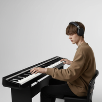 Piano numérique portable pliable 88 touches personnalisable, léger et rechargeable, avec 127 rythmes, 128 sons et 79 morceaux de démonstration pour